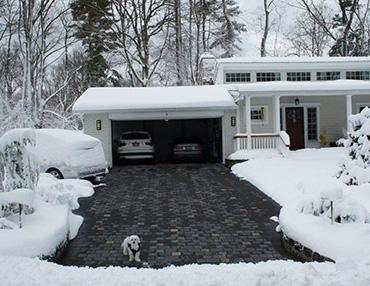 The completed heated driveway after a big snowstorm.