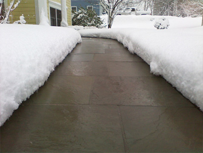 Heated driveway after snowstorm in Denver.