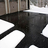 Custom snow melting system heating driveway and walkways