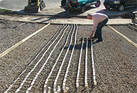 Heat a narrow strip in the center of the driveway.