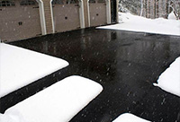 Heated concrete driveway after a big snowstorm.