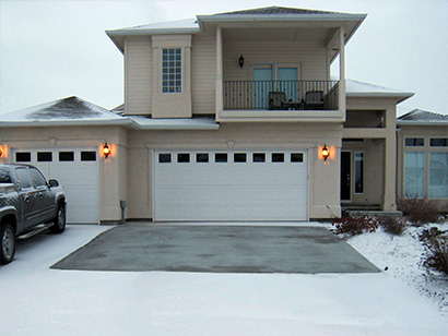 Heated concrete driveway after snowstorm.