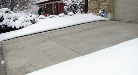 A heated driveway after a snowstorm